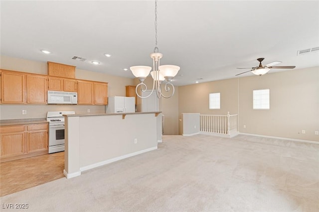 kitchen with light brown cabinetry, white appliances, decorative light fixtures, and light colored carpet