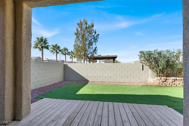 wooden deck with a yard