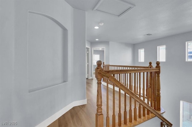 hallway featuring hardwood / wood-style flooring