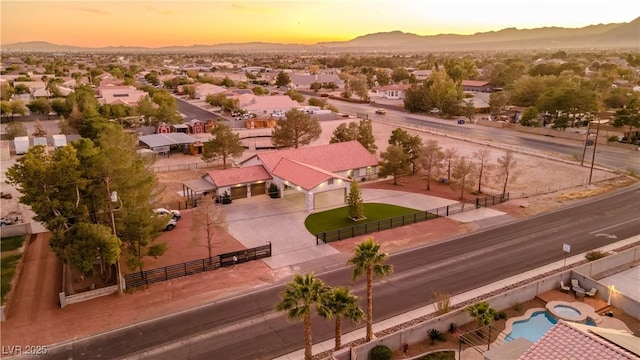 aerial view at dusk with a mountain view