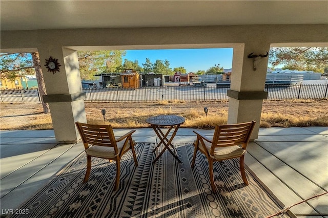 view of patio / terrace featuring a water view