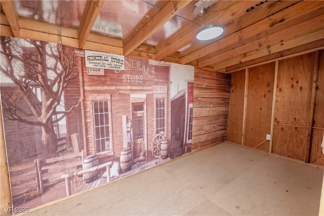 interior space featuring wooden walls