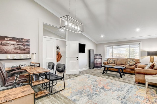 living room featuring ornamental molding, lofted ceiling, an inviting chandelier, and light hardwood / wood-style floors