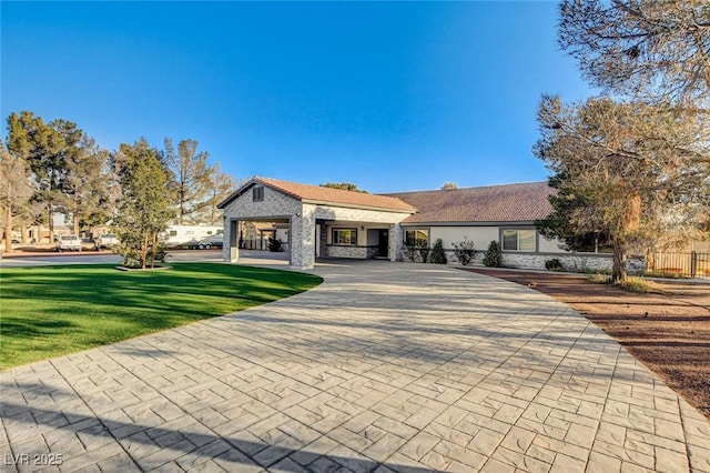 ranch-style house with a front yard