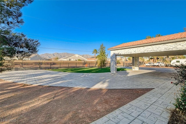 view of yard with a mountain view