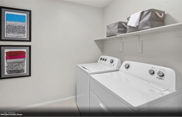 laundry room with washing machine and dryer