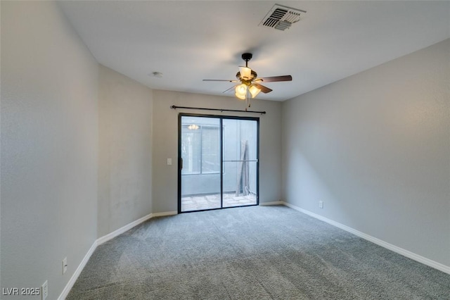 carpeted empty room with ceiling fan