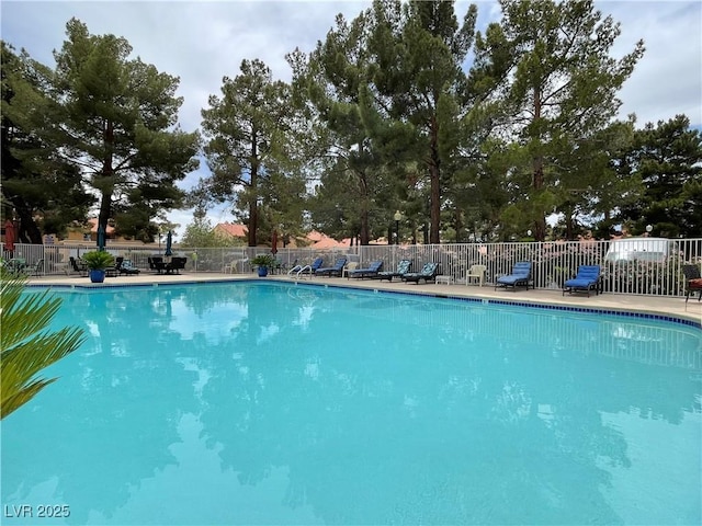 community pool with fence