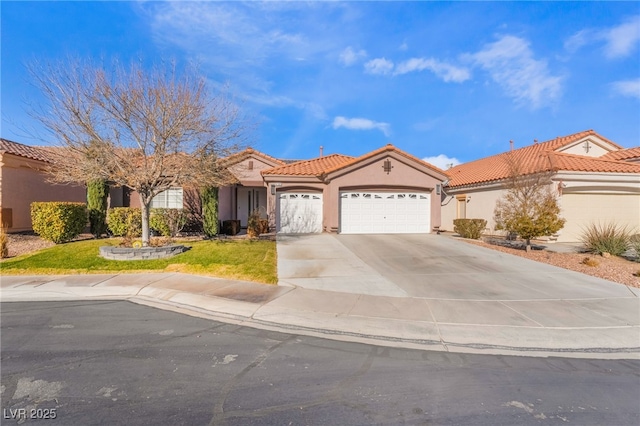 mediterranean / spanish-style home featuring a garage