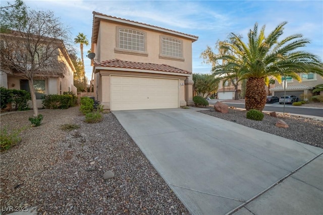 view of front of property with a garage