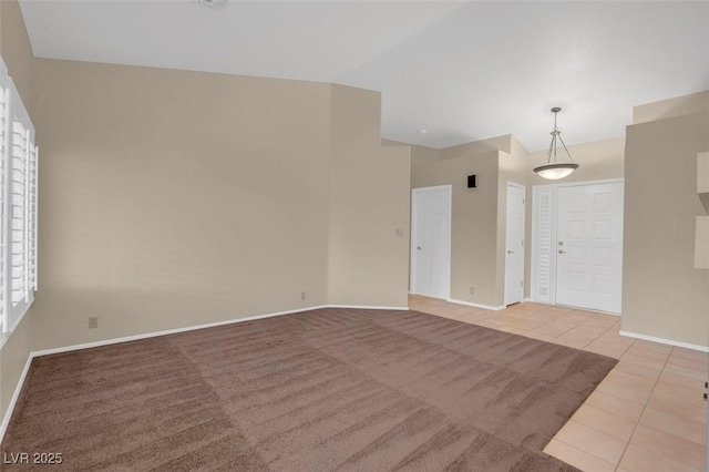 empty room featuring light tile patterned floors