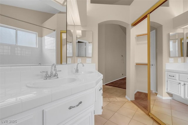 bathroom featuring vanity and tile patterned flooring