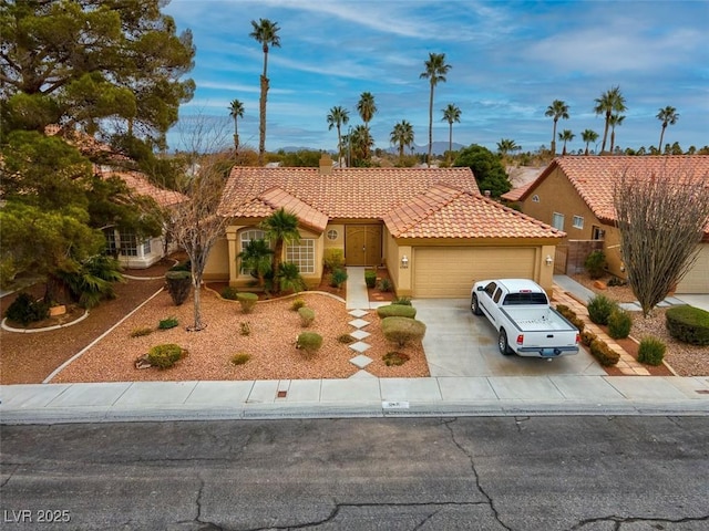 view of front of home with a garage