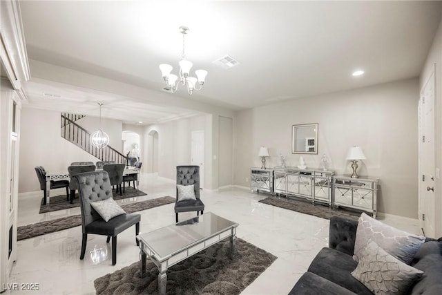 living room with a notable chandelier