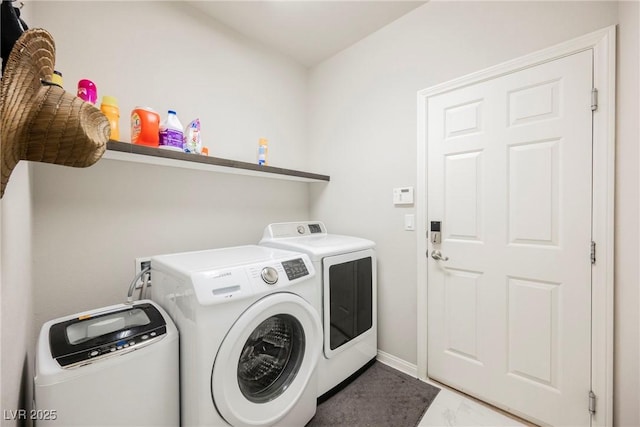 laundry area featuring washer and clothes dryer