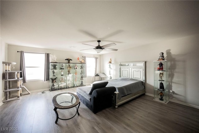 bedroom with hardwood / wood-style flooring and ceiling fan