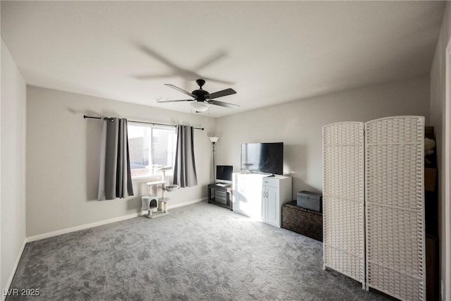 unfurnished living room featuring carpet floors and ceiling fan