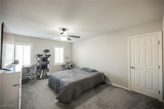 bedroom with ceiling fan and carpet flooring