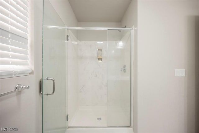 bathroom with an enclosed shower