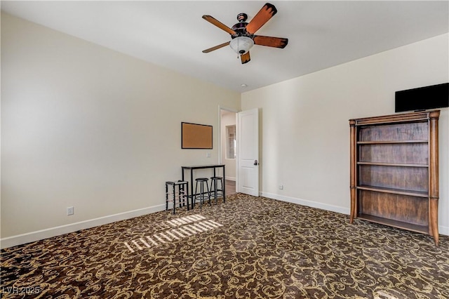 interior space featuring ceiling fan