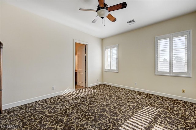 unfurnished room featuring carpet floors and ceiling fan