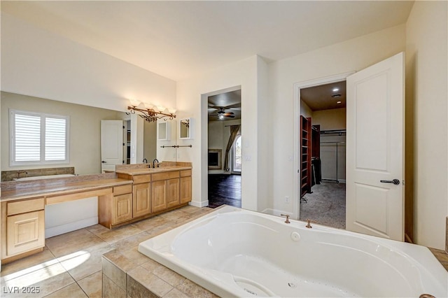 bathroom with vanity, tile patterned floors, and ceiling fan