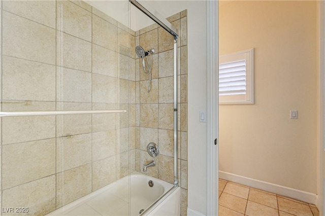 bathroom featuring tile patterned floors and enclosed tub / shower combo