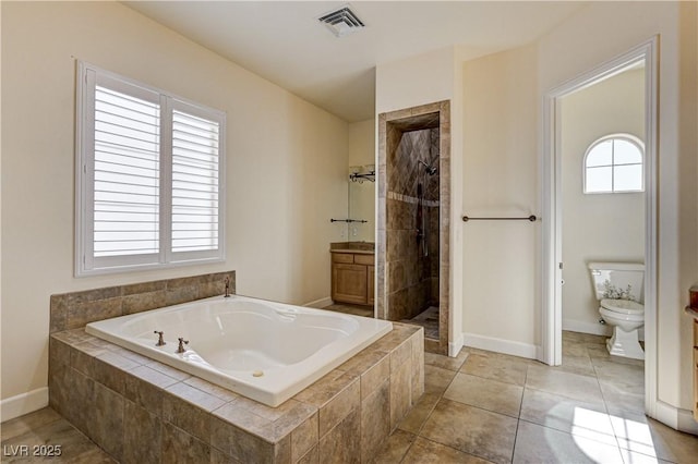 full bathroom with vanity, tile patterned floors, shower with separate bathtub, and toilet