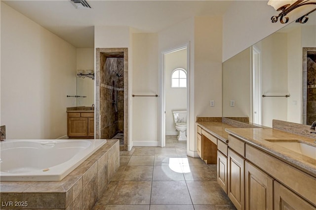 full bathroom featuring tile patterned floors, vanity, toilet, and plus walk in shower