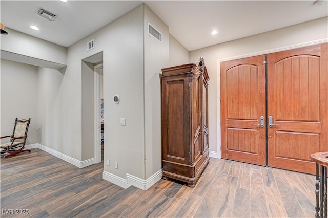 foyer featuring dark hardwood / wood-style flooring