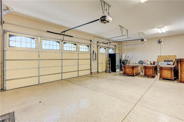 garage featuring a garage door opener