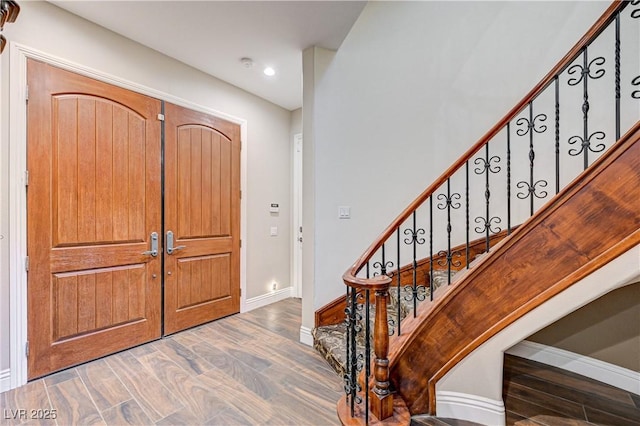 foyer with hardwood / wood-style floors