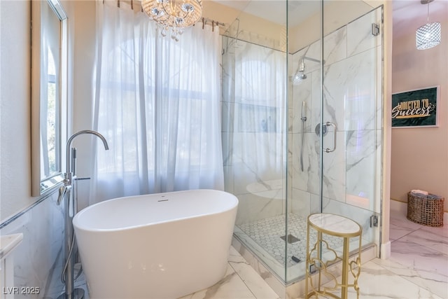 bathroom with shower with separate bathtub