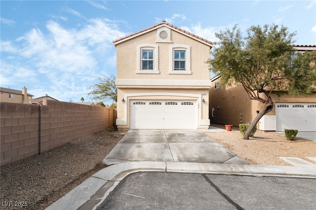 view of front of property with a garage