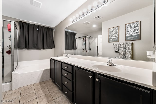 bathroom featuring tile patterned flooring, vanity, and plus walk in shower