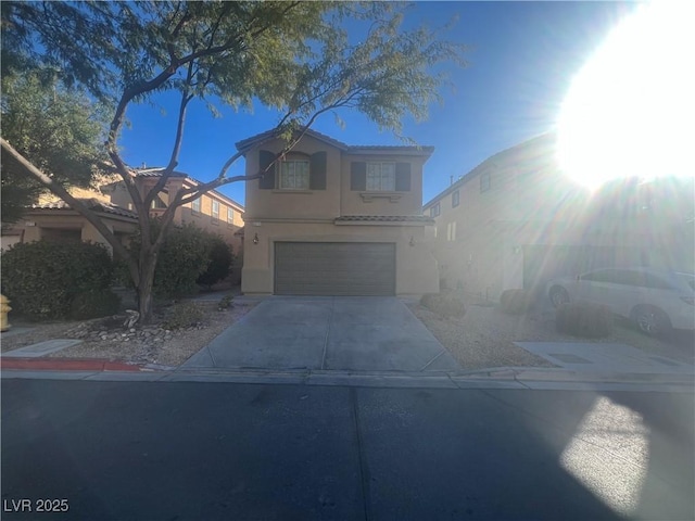 view of front of home with a garage