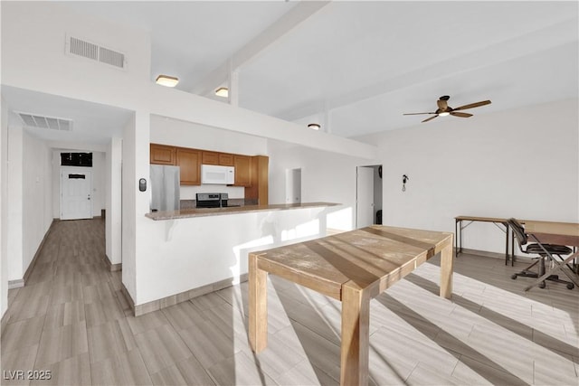 dining room with ceiling fan