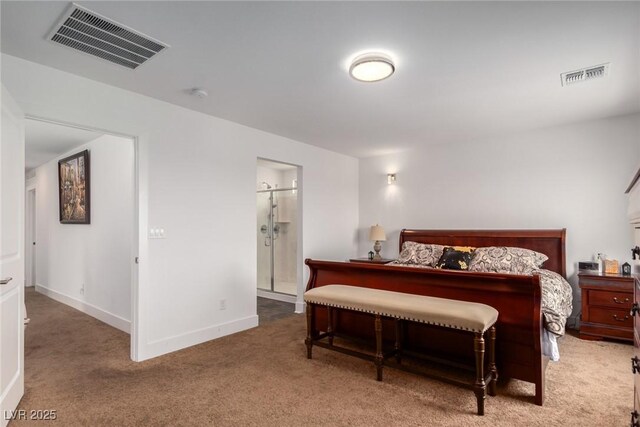 bedroom featuring carpet and ensuite bathroom