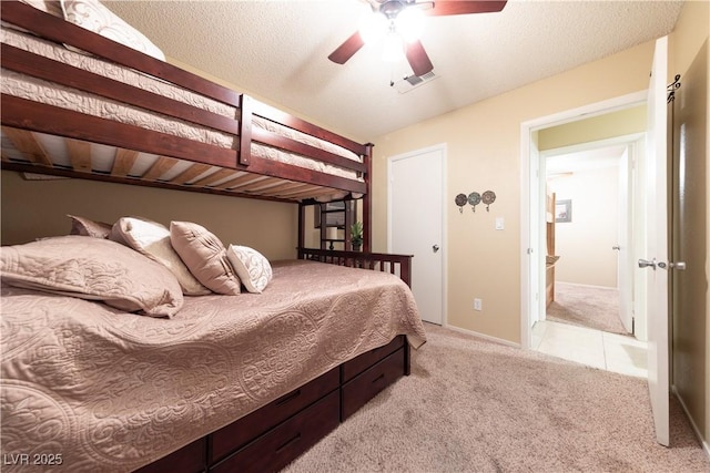 bedroom with light carpet and ceiling fan