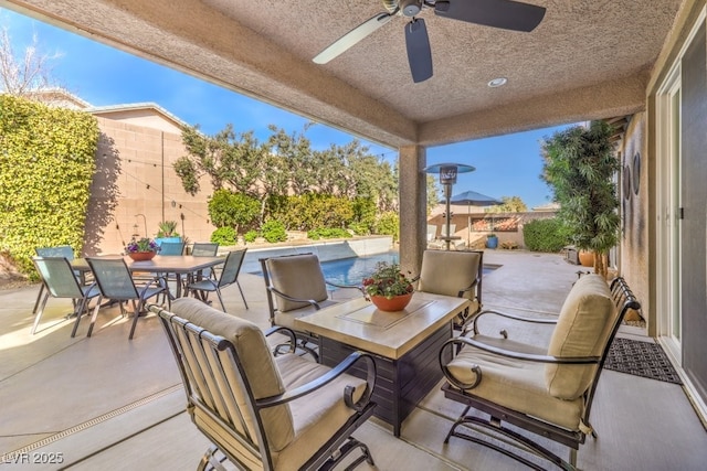 view of patio with ceiling fan