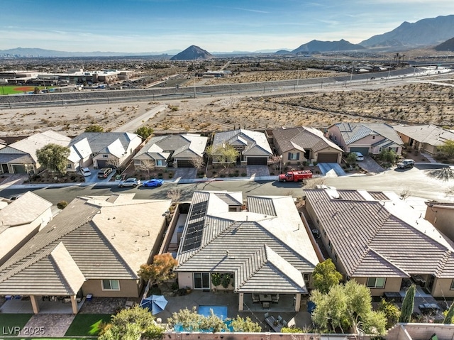 bird's eye view with a mountain view