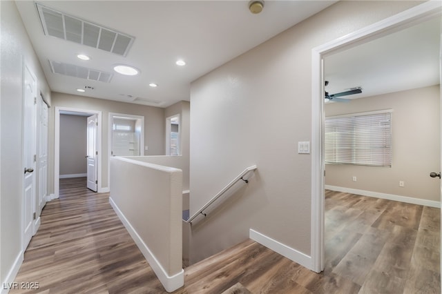 hallway featuring hardwood / wood-style flooring