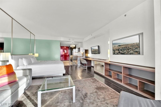 bedroom featuring hardwood / wood-style flooring