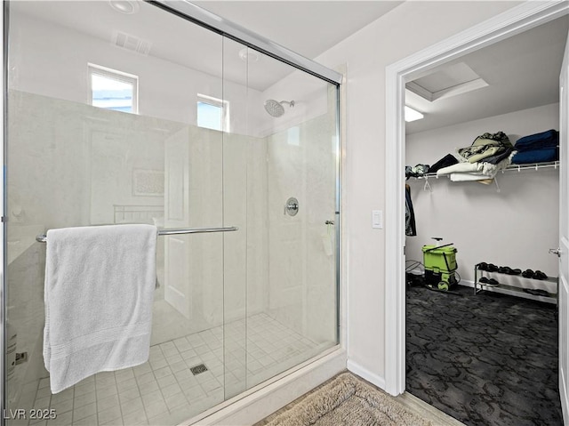 bathroom featuring an enclosed shower