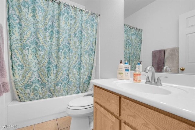 full bathroom featuring vanity, tile patterned floors, toilet, and shower / bathtub combination with curtain