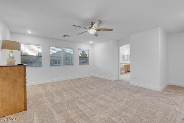 carpeted empty room with ceiling fan