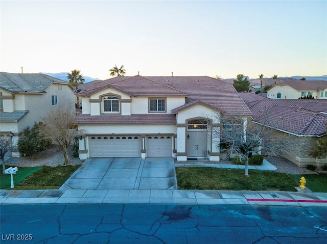 view of front of property featuring a garage