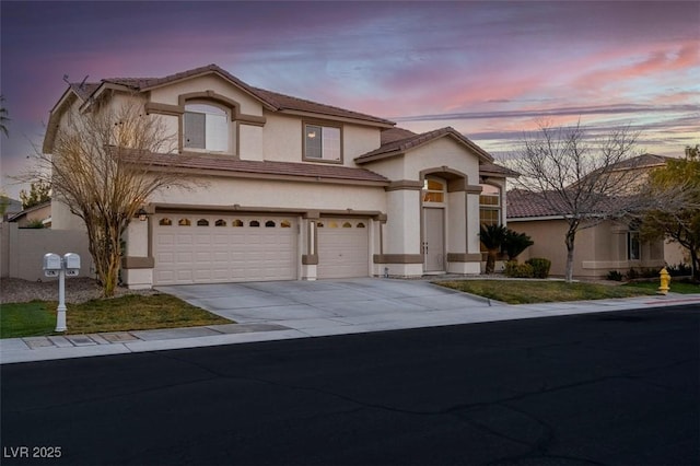 view of front of home with a garage