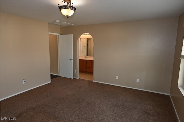 empty room featuring light colored carpet