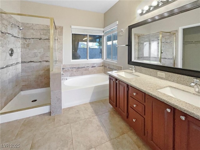 bathroom featuring tile patterned floors, vanity, and separate shower and tub